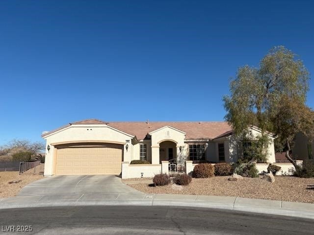 ranch-style house featuring a garage