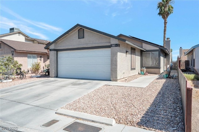 single story home featuring a garage