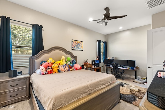 carpeted bedroom with ceiling fan