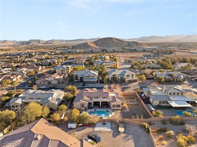 drone / aerial view featuring a mountain view