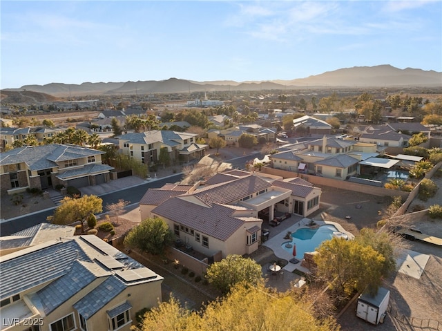 bird's eye view with a mountain view