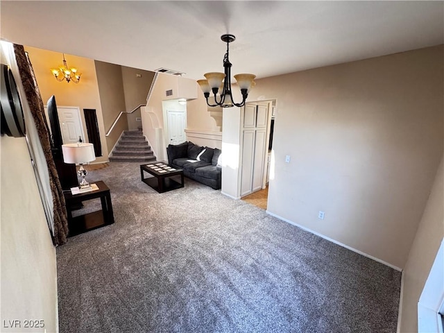 carpeted living room with a notable chandelier