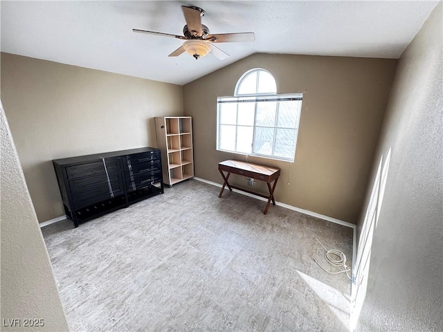 misc room with vaulted ceiling and ceiling fan