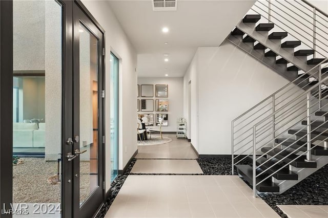 hall featuring tile patterned floors