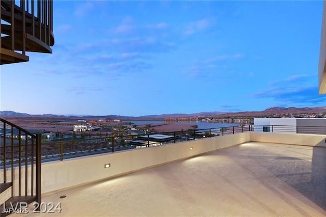 view of patio / terrace with a mountain view