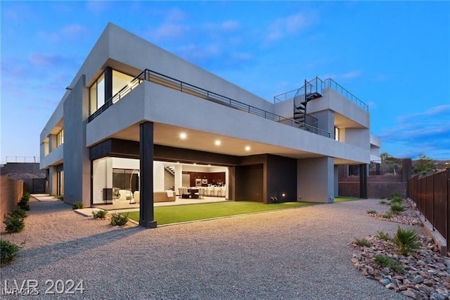 rear view of house featuring an outdoor living space