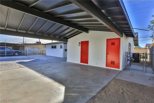 garage with a carport