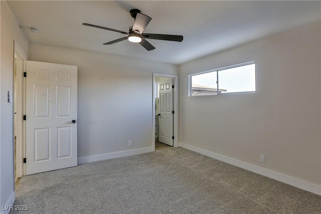 unfurnished bedroom with ceiling fan and light carpet