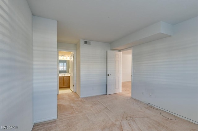 5340 Silvermist Ct Unit 103, Las Vegas, NV 89122 - unfurnished bedroom featuring light colored carpet and ensuite bath