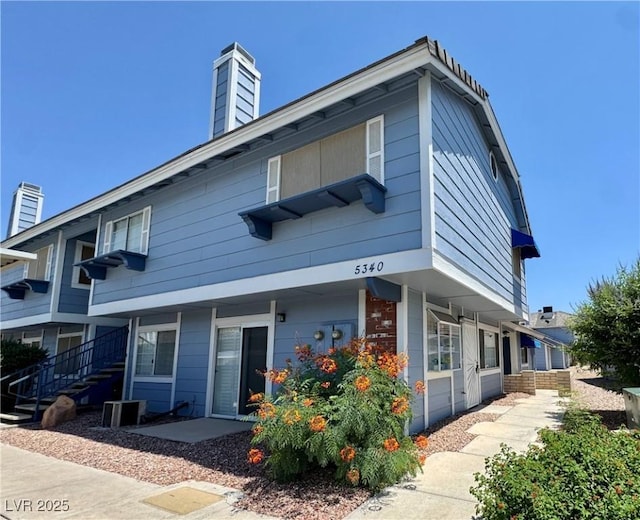 5340 Silvermist Ct Unit 103, Las Vegas, NV 89122 - view of front of home with a chimney