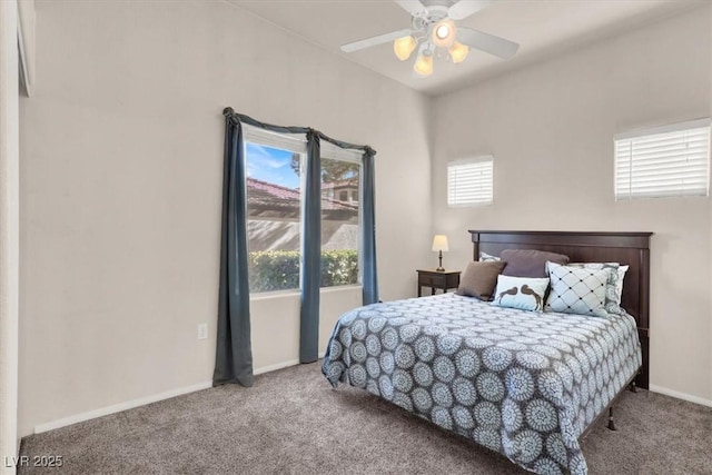 bedroom with ceiling fan and light carpet