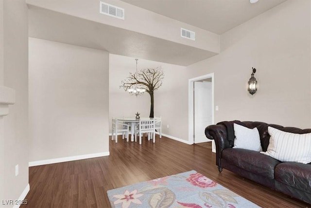 living room featuring dark wood-type flooring