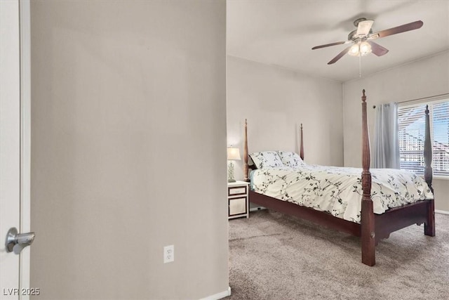 bedroom with ceiling fan and carpet