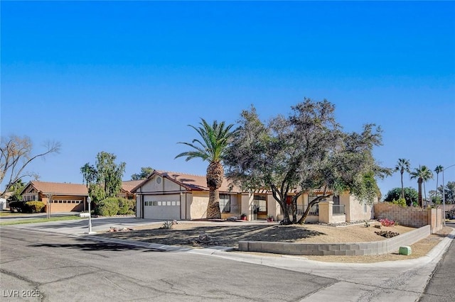 view of front of home with a garage