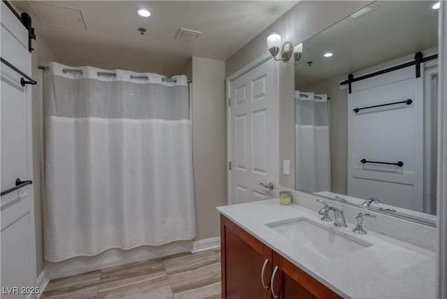 bathroom with vanity and shower / bathtub combination with curtain