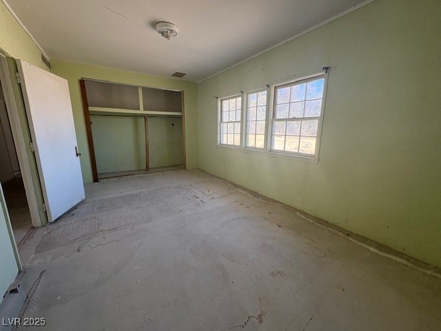 unfurnished bedroom featuring a closet