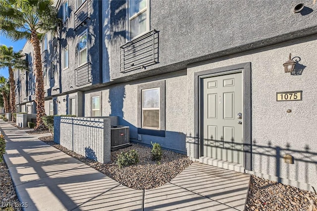 property entrance featuring central air condition unit