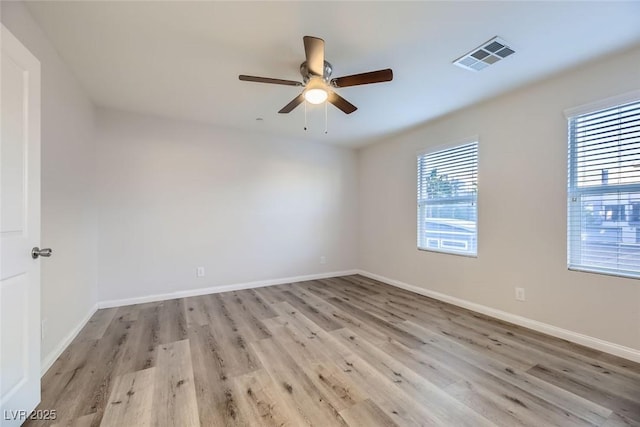 unfurnished room with light hardwood / wood-style floors and ceiling fan