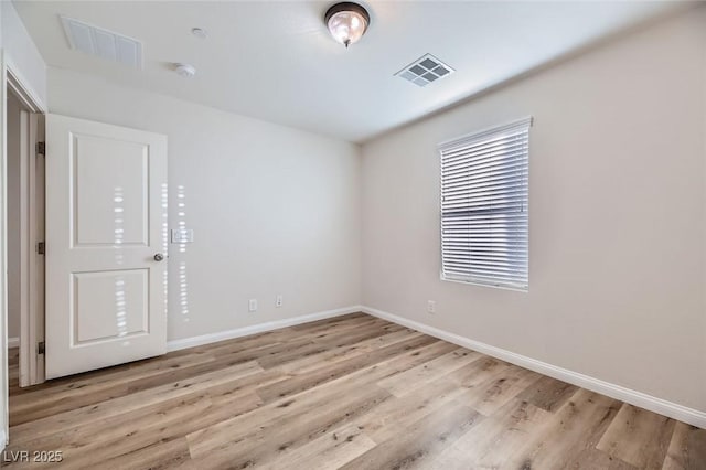 empty room featuring light hardwood / wood-style flooring