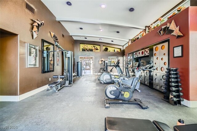 workout area featuring vaulted ceiling