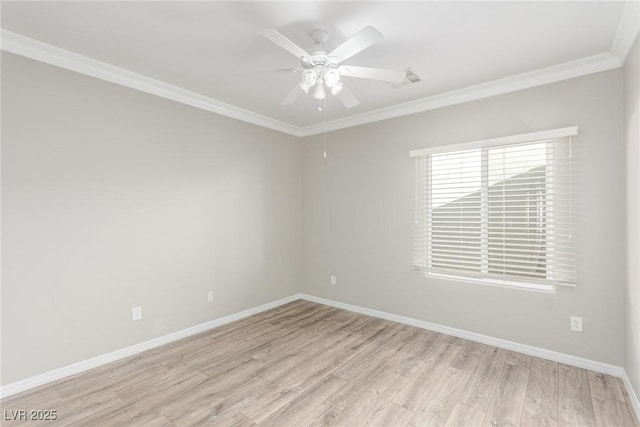 spare room featuring ceiling fan, light hardwood / wood-style flooring, and ornamental molding