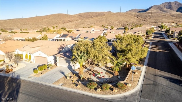 aerial view featuring a mountain view