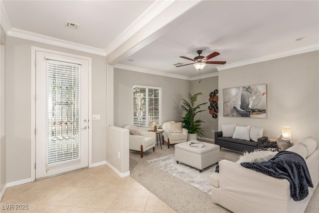 tiled living room featuring ceiling fan and crown molding