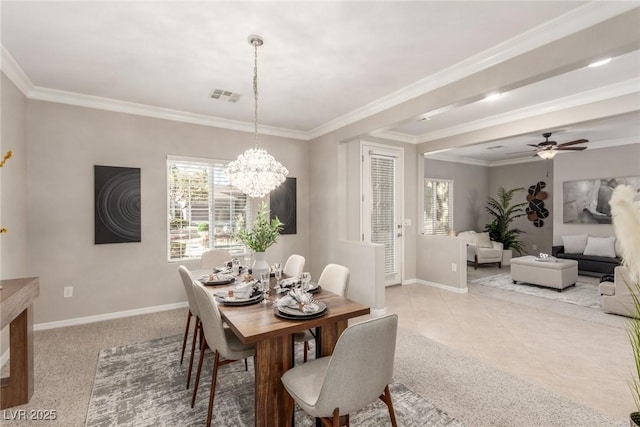 dining area with ceiling fan with notable chandelier and crown molding