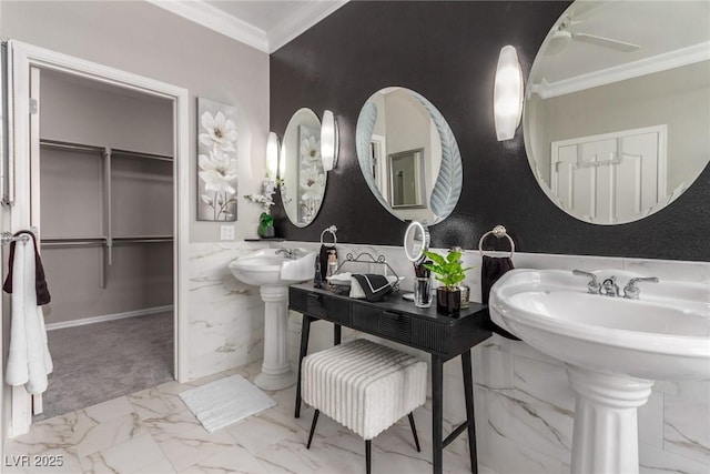 bathroom with sink and ornamental molding