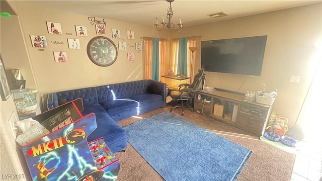 living room with carpet and a chandelier