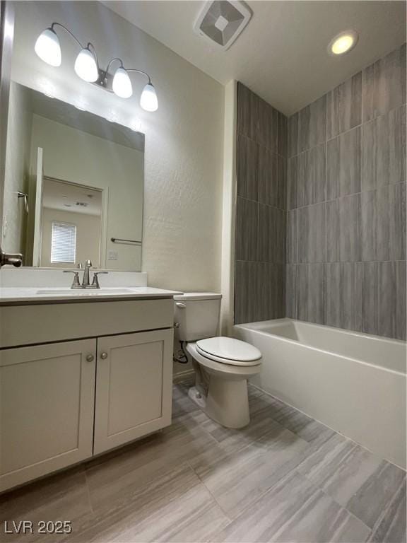 full bathroom with vanity, toilet, and shower / washtub combination