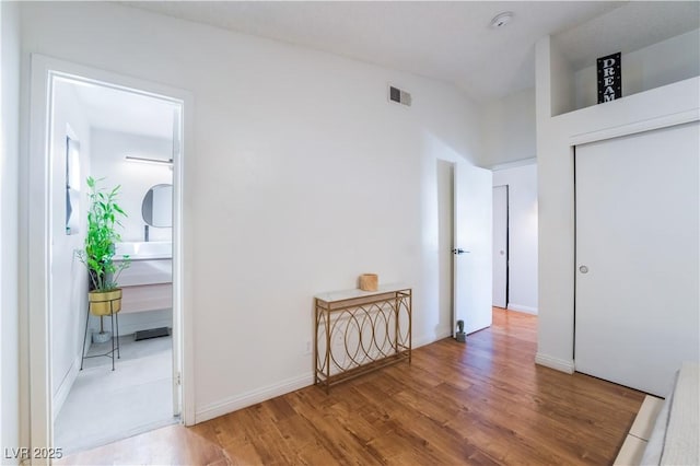 hall featuring hardwood / wood-style floors