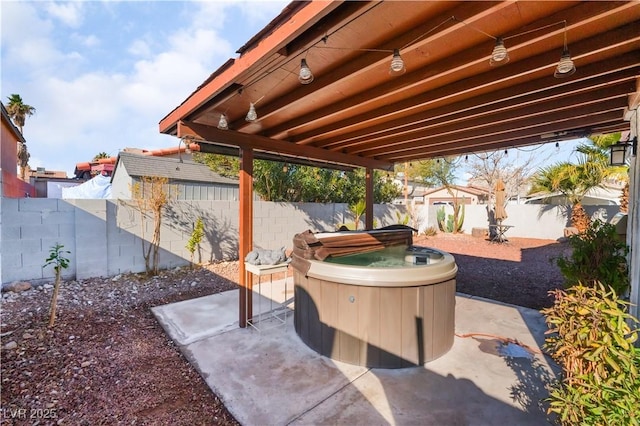 view of patio featuring a hot tub