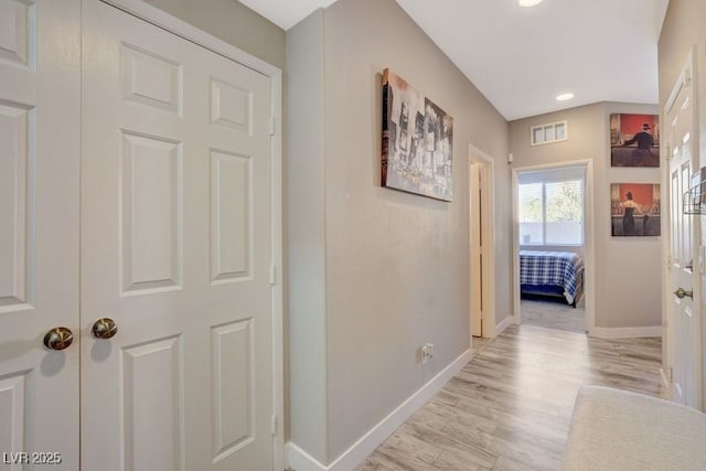 hallway featuring light wood-type flooring