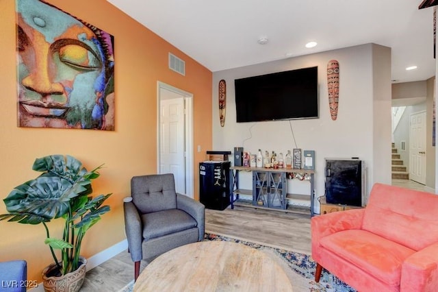 living room with wood-type flooring