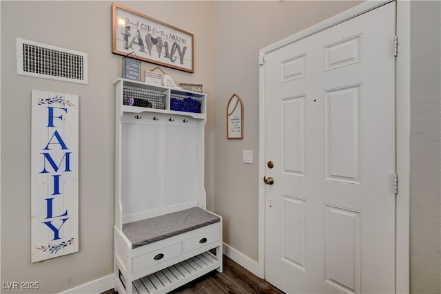 mudroom with dark hardwood / wood-style flooring