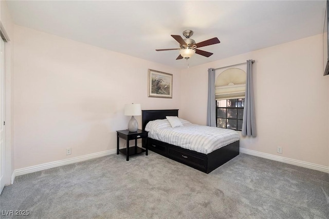 bedroom featuring ceiling fan and light colored carpet