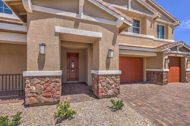 property entrance featuring a garage