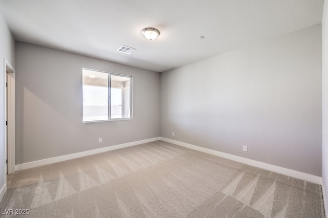 empty room featuring carpet floors