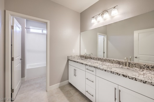 bathroom featuring tile patterned floors and vanity