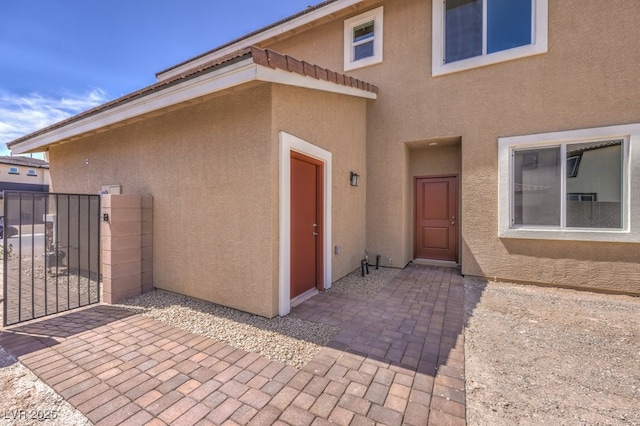 property entrance with a patio area