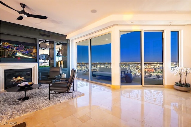 interior space featuring ceiling fan