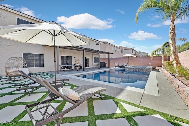 view of swimming pool featuring an in ground hot tub and a patio