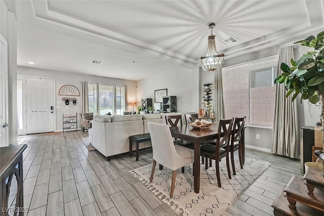 dining room featuring a chandelier