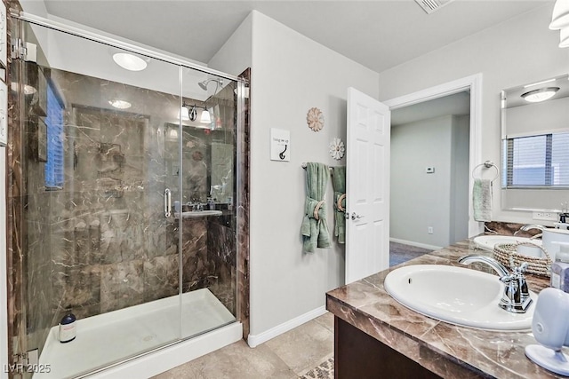 bathroom featuring vanity and walk in shower