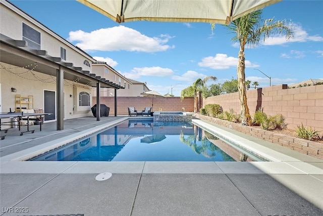 view of swimming pool with a patio and area for grilling