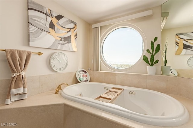 bathroom featuring tiled bath