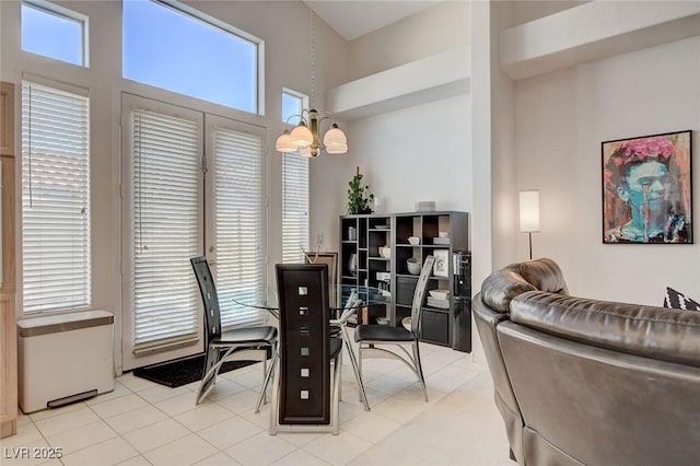 dining room with a notable chandelier and a healthy amount of sunlight