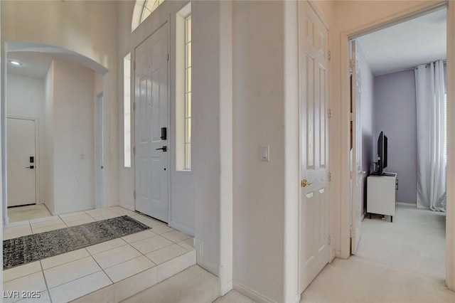 foyer with light tile patterned floors