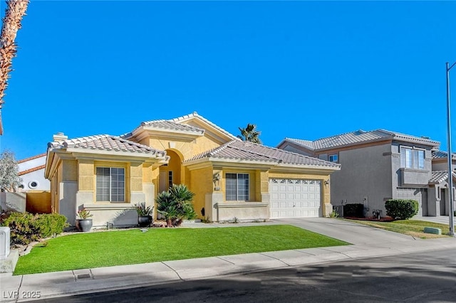 view of front of home with a garage, driveway, a tiled roof, a front lawn, and stucco siding